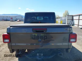 2023 Jeep Gladiator Sport S z VIN 1C6HJTAG2PL575276, wystawiony jako IAAI lot #42056473 z przebiegiem 17 043 mil mil oraz . Historia ofert i sprzedaży dostępna na DreamBid. Obrazek 16.