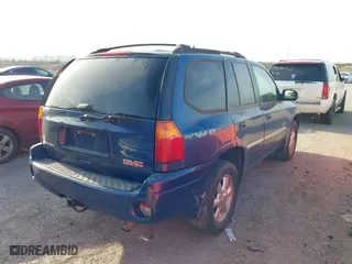 2006 GMC Envoy SLE with VIN 1GKDS13SX62315193, listed as a IAAI auction lot 41866029 with 231,164 mi miles. Bid and sale history available at carsss.com. Image 4.