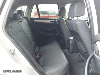 2015 BMW X1 sDrive28i with VIN WBAVM1C53FV318663, listed as a IAAI auction lot 41711526 with 182,204 mi miles. Bid and sale history available at carsss.com. Image 8.