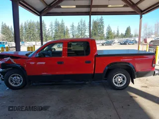 2001 Dodge Dakota Sport with VIN 1B7GL2AN81S106374, listed as a IAAI auction lot 41435940 with 183,540 mi miles. Bid and sale history available at carsss.com. Image 14.