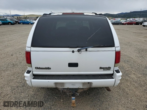 1997 Oldsmobile Bravada z VIN 1GHDT13W7V2711487, wystawiony jako Copart lot #57820455 z przebiegiem 182 784 mil mil oraz Tytuł czysty. Historia ofert i sprzedaży dostępna na DreamBid. Obrazek 6.