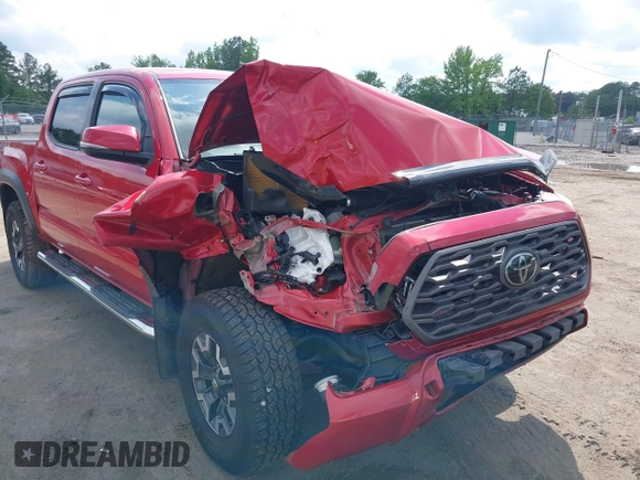 2021 Toyota Tacoma SR z VIN 5TFCZ5AN2MX263159, wystawiony jako IAAI lot #42273087 z przebiegiem 69 220 mil mil oraz . Historia ofert i sprzedaży dostępna na DreamBid. Obrazek 6.