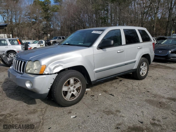 2007 Jeep Grand Cherokee Laredo with VIN 1J8HS48P57C697382, listed as a Copart auction lot 87682865 with 154,732 mi miles and Salvage Title. Bid and sale history available at carsss.com. Image 1.