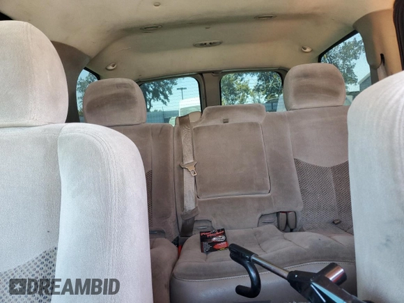 2004 Chevrolet Tahoe LS with VIN 1GNEC13V84R125640, listed as a Copart auction lot 64963995 with Not provided miles and Clean title. Bid and sale history available at DreamBid. Image 10.