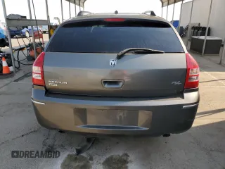 2008 Dodge Magnum z VIN 2D8GZ57208H100293, wystawiony jako Copart lot #69345394 z przebiegiem 191 085 mil mil oraz Szkoda całkowita • Salvage title. Historia ofert i sprzedaży dostępna na DreamBid. Obrazek 6.