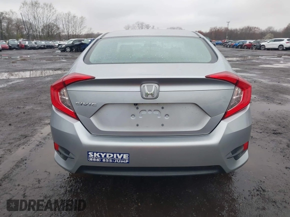 2016 Honda Civic EX with VIN 19XFC2F75GE217935, listed as a IAAI auction lot 41963307 with 87,477 mi miles and . Bid and sale history available at DreamBid. Image 16.