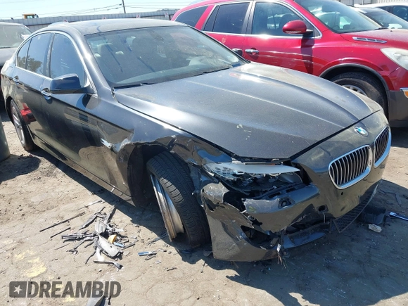 2012 BMW 5 Series 528i with VIN WBAXG5C58CDY28516, listed as a IAAI auction lot 41907803 with 116,499 mi miles. Bid and sale history available at carsss.com. Image 1.