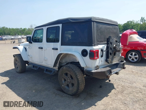 2018 Jeep Wrangler Unlimited Sport S with VIN 1C4HJXDGXJW146873, listed as a IAAI auction lot 42404813 with 73,929 mi miles and . Bid and sale history available at DreamBid. Image 3.
