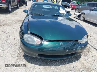 1999 Mazda MX-5 Miata with VIN JM1NB3539X0123231, listed as a IAAI auction lot 42314156 with 154,755 mi miles and . Bid and sale history available at DreamBid. Image 18.