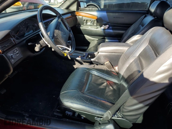 1999 Cadillac Eldorado Touring z VIN 1G6ET1293XU611368, wystawiony jako Copart lot #82683114 z przebiegiem 126 178 mil mil oraz Szkody całkowita. Historia ofert i sprzedaży dostępna na DreamBid. Obrazek 7.
