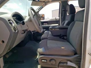 2006 Ford F-150 XLT with VIN 1FTPW12V26KD80614, listed as a Copart auction lot 58308615 with 159,508 mi miles and Salvage title. Bid and sale history available at DreamBid. Image 7.