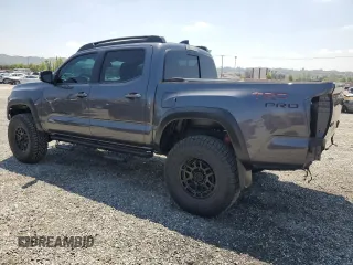 2023 Toyota Tacoma SR z VIN 3TYCZ5AN3PT165207, wystawiony jako Copart lot #54628175 z przebiegiem 15 932 mil mil oraz Szkoda całkowita • Salvage title. Historia ofert i sprzedaży dostępna na DreamBid. Obrazek 2.