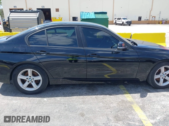 2014 BMW 3 Series 320i with VIN WBA3B1C55EK135357, listed as a IAAI auction lot 42158550 with 148,911 mi miles. Bid and sale history available at carsss.com. Image 6.