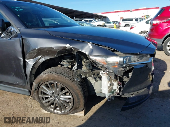 2017 Mazda CX-5 Touring with VIN JM3KFBCL2H0165625, listed as a IAAI auction lot 41879145 with 64,745 mi miles. Bid and sale history available at carsss.com. Image 6.
