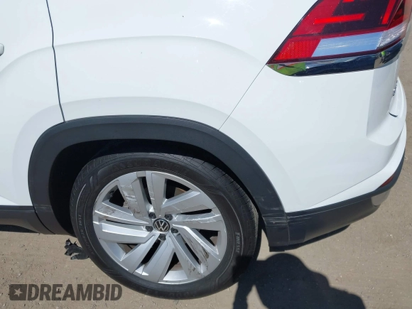2021 Volkswagen Atlas SE with VIN 1V2HE2CA2MC209716, listed as a IAAI auction lot 42710825 with 29,484 mi miles and . Bid and sale history available at DreamBid. Image 6.