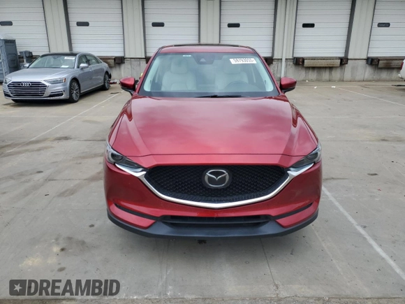 2018 Mazda CX-5 Grand Touring with VIN JM3KFADM8J0444455, listed as a Copart auction lot 59793055 with 60,839 mi miles and Salvage title. Bid and sale history available at DreamBid. Image 5.