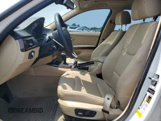 2009 BMW 3 Series 328i with VIN WBAPH73559E128710, listed as a Copart auction lot 59274055 with 105,399 mi miles and Salvage title. Bid and sale history available at DreamBid. Image 7.