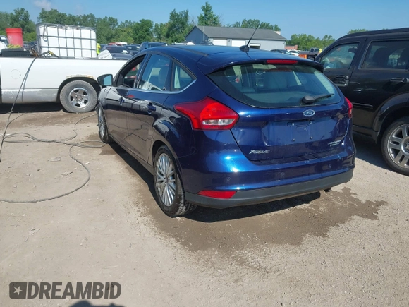 2016 Ford Focus Titanium with VIN 1FADP3N23GL231613, listed as a IAAI auction lot 42645683 with 76,072 mi miles and . Bid and sale history available at DreamBid. Image 3.