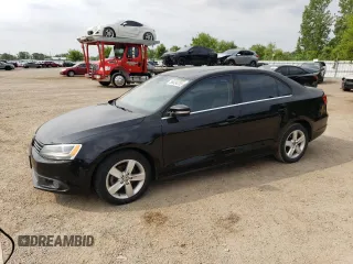 2013 Volkswagen Jetta TDI w/Premium z VIN 3VW3L7AJ9DM432252, wystawiony jako Copart lot #56634255 z przebiegiem 126 827 mil mil oraz Szkoda całkowita • Salvage title. Historia ofert i sprzedaży dostępna na DreamBid. Obrazek 1.