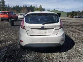 2018 Ford Fiesta SE with VIN 3FADP4EJ1JM128130, listed as a Copart auction lot 50574285 with 141,002 mi miles and Salvage Title. Bid and sale history available at DreamBid. Image 6.