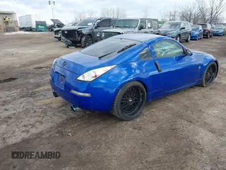 2004 Nissan 350Z Touring with VIN JN1AZ34E04T052916, listed as a IAAI auction lot 41450917 with 157,699 mi miles. Bid and sale history available at carsss.com. Image 4.