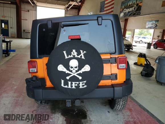 2013 Jeep Wrangler Unlimited Sport with VIN 1C4BJWDG7DL557119, listed as a Copart auction lot 63186715 with 86,241 mi miles and Salvage title. Bid and sale history available at DreamBid. Image 6.