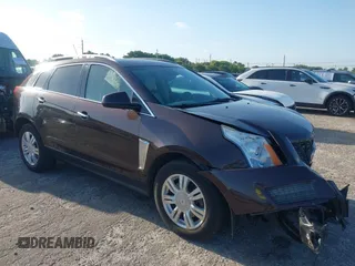 2015 Cadillac SRX Luxury Collection z VIN 3GYFNEE33FS528834, wystawiony jako IAAI lot #42113514 z przebiegiem 146 326 mil mil oraz . Historia ofert i sprzedaży dostępna na DreamBid. Obrazek 1.