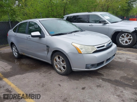 2008 Ford Focus SE with VIN 1FAHP35NX8W152337, listed as a IAAI auction lot 42114878 with 239,583 mi miles. Bid and sale history available at carsss.com. Image 1.