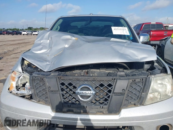 2015 Nissan Frontier S z VIN 1N6BD0CT7FN716390, wystawiony jako IAAI lot #42519222 z przebiegiem 175 588 mil mil oraz . Historia ofert i sprzedaży dostępna na DreamBid. Obrazek 12.