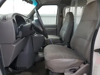 1997 Ford Econoline Wagon XL z VIN 1FMEE1163VHB75718, wystawiony jako Copart lot #71769224 z przebiegiem 79 635 mil mil oraz Szkody całkowita. Historia ofert i sprzedaży dostępna na DreamBid. Obrazek 7.