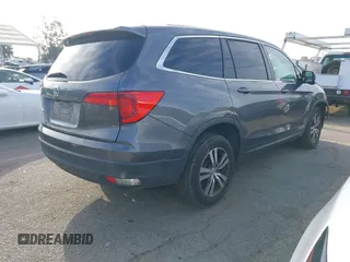 2016 Honda Pilot EX with VIN 5FNYF5H33GB015231, listed as a IAAI auction lot 41809357 with 145,970 mi miles. Bid and sale history available at carsss.com. Image 4.