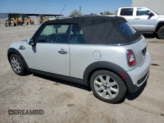 2011 MINI Convertible S with VIN WMWZP3C55BTX84489, listed as a Copart auction lot 57680375 with 86,313 mi miles and Clean title. Bid and sale history available at DreamBid. Image 2.