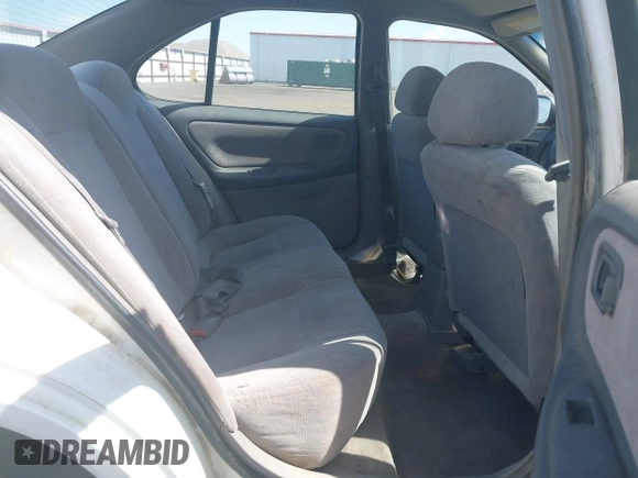 1999 Nissan Altima XE with VIN 1N4DL01D9XC104530, listed as a IAAI auction lot 42141246 with 168,803 mi miles. Bid and sale history available at carsss.com. Image 8.