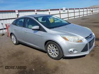 2012 Ford Focus SE with VIN 1FAHP3F24CL178236, listed as a IAAI auction lot 42032272 with 157,373 mi miles. Bid and sale history available at carsss.com. Image 1.