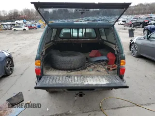2002 Toyota Tacoma with VIN 5TEPM62NX2Z892453, listed as a Copart auction lot 82680794 with 76,056 mi miles and Salvage title. Bid and sale history available at DreamBid. Image 6.