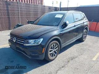 2021 Volkswagen Tiguan S with VIN 3VV1B7AX2MM142289, listed as a IAAI auction lot 42403346 with 71,182 mi miles and . Bid and sale history available at DreamBid. Image 17.
