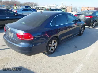 2013 Volkswagen Passat SE with VIN 1VWBP7A3XDC106575, listed as a IAAI auction lot 41856366 with 216,897 mi miles. Bid and sale history available at carsss.com. Image 4.