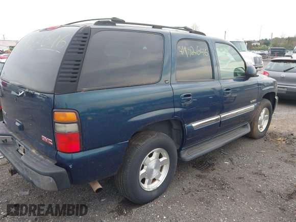 2005 GMC Yukon SLT with VIN 1GKEK13T15R196436, listed as a IAAI auction lot 41952646 with 247,487 mi miles. Bid and sale history available at carsss.com. Image 4.