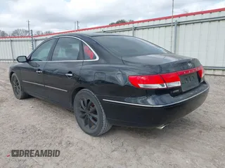 2006 Hyundai Azera SE with VIN KMHFC46F16A087393, listed as a IAAI auction lot 41475177 with 124,197 mi miles and . Bid and sale history available at DreamBid. Image 3.