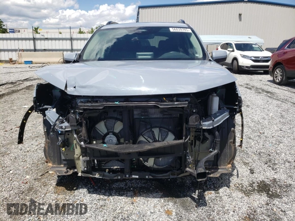 2023 Honda Pilot Touring with VIN 5FNYG2H78PB006054, listed as a Copart auction lot 56039785 with 35,831 mi miles and Salvage title. Bid and sale history available at DreamBid. Image 5.