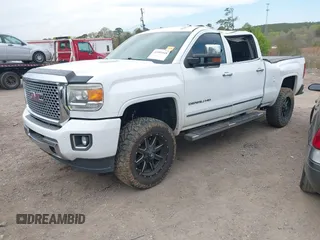 2016 GMC Sierra 2500HD Denali z VIN 1GT12UE82GF130096, wystawiony jako IAAI lot #41869448 z przebiegiem 129 659 mil mil oraz . Historia ofert i sprzedaży dostępna na DreamBid. Obrazek 17.