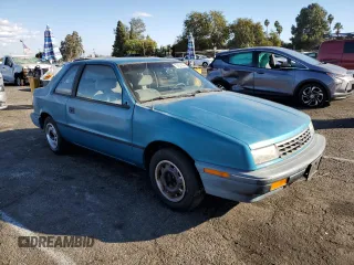 1991 Plymouth Sundance z VIN 1P3XP24D6MN564571, wystawiony jako Copart lot #78415044 z przebiegiem 50 625 mil mil oraz Tytuł czysty. Historia ofert i sprzedaży dostępna na DreamBid. Obrazek 4.