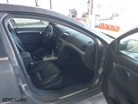 2007 Saturn Aura XR with VIN 1G8ZV57747F121334, listed as a IAAI auction lot 42062408 with 150,512 mi miles. Bid and sale history available at carsss.com. Image 5.