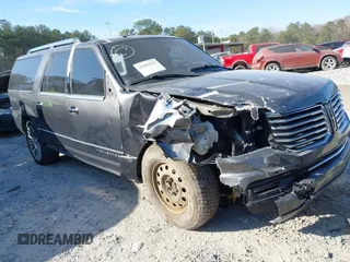 2015 Lincoln Navigator z VIN 5LMJJ3JT3FEJ09214, wystawiony jako IAAI lot #41682213 z przebiegiem 133 997 mil mil oraz . Historia ofert i sprzedaży dostępna na DreamBid. Obrazek 1.