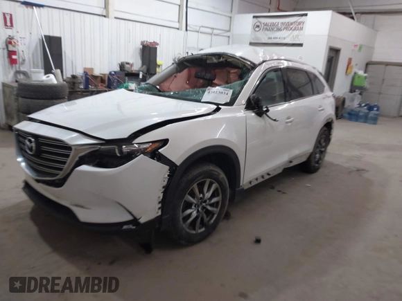 2016 Mazda CX-9 Touring with VIN JM3TCBCY3G0114707, listed as a IAAI auction lot 42023034 with 225,281 mi miles and . Bid and sale history available at DreamBid. Image 17.