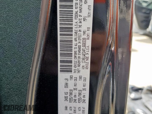 2015 Jeep Wrangler Unlimited Sahara with VIN 1C4BJWEG4FL668339, listed as a Copart auction lot 61221325 with 117,887 mi miles and Salvage title. Bid and sale history available at DreamBid. Image 13.