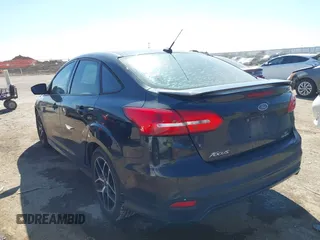 2015 Ford Focus SE with VIN 1FADP3F24FL313640, listed as a IAAI auction lot 41651845 with 146,390 mi miles. Bid and sale history available at carsss.com. Image 3.