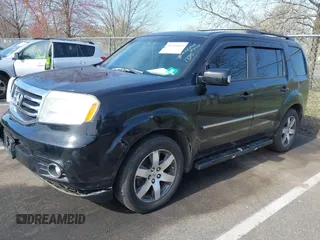 2012 Honda Pilot Touring with VIN 5FNYF4H96CB041380, listed as a IAAI auction lot 41941615 with 137,537 mi miles and . Bid and sale history available at DreamBid. Image 17.