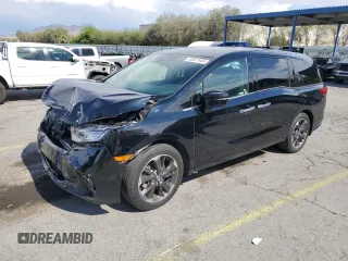 2023 Honda Odyssey Elite with VIN 5FNRL6H96PB006305, listed as a Copart auction lot 55811935 with 57,612 mi miles and Salvage title. Bid and sale history available at DreamBid. Image 1.