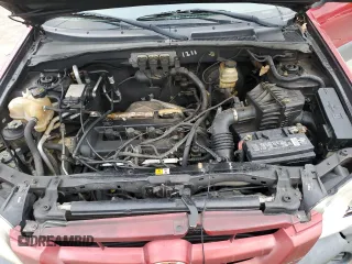 2005 Mazda Tribute i with VIN 4F2YZ02Z55KM63784, listed as a Copart auction lot 82362674 with Not Provided miles and Salvage Title. Bid and sale history available at carsss.com. Image 12.